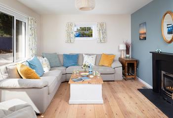 The sitting room is a light and bright space, bursting with colour.