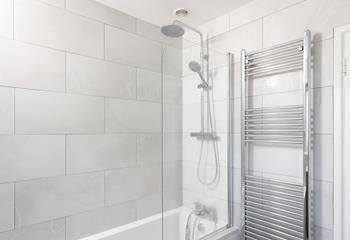 Spend days rambling along the nearby coast, and evenings relaxing in the bath.
