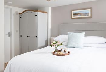 Bedroom 1 has a sumptuous king size bed, and plenty of storage.