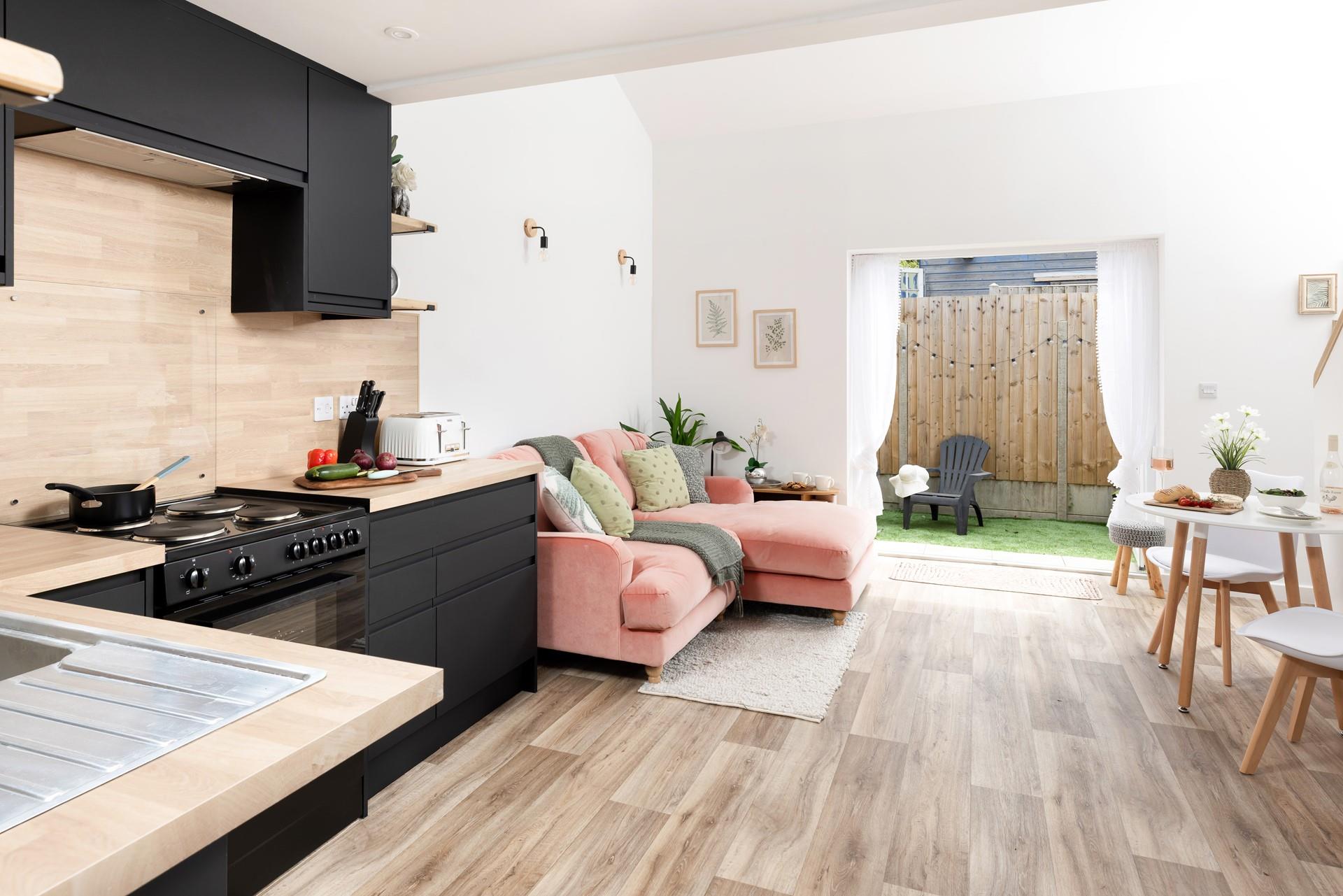 The modern living area has all you need for a relaxing stay.