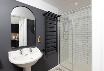 Step into the spacious walk in shower!