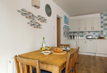 Open plan living includes a kitchen and dining area.