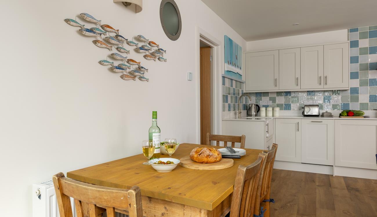 Open plan living includes a kitchen and dining area.
