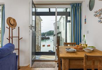 Enjoy quaint views of boats bobbing as the tide ebbs and flows.