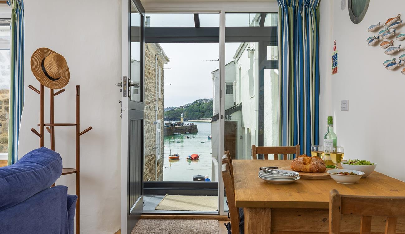 Enjoy quaint views of boats bobbing as the tide ebbs and flows.