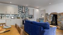 Beautiful cottage features blend with modern amenities to create a relaxing escape.