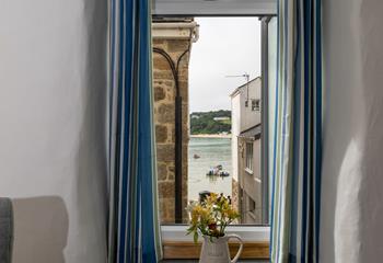 Gaze across the harbour to the ever-changing view.