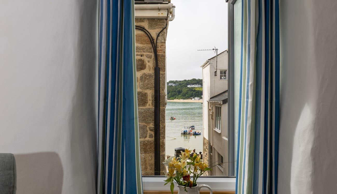 Gaze across the harbour to the ever-changing view.