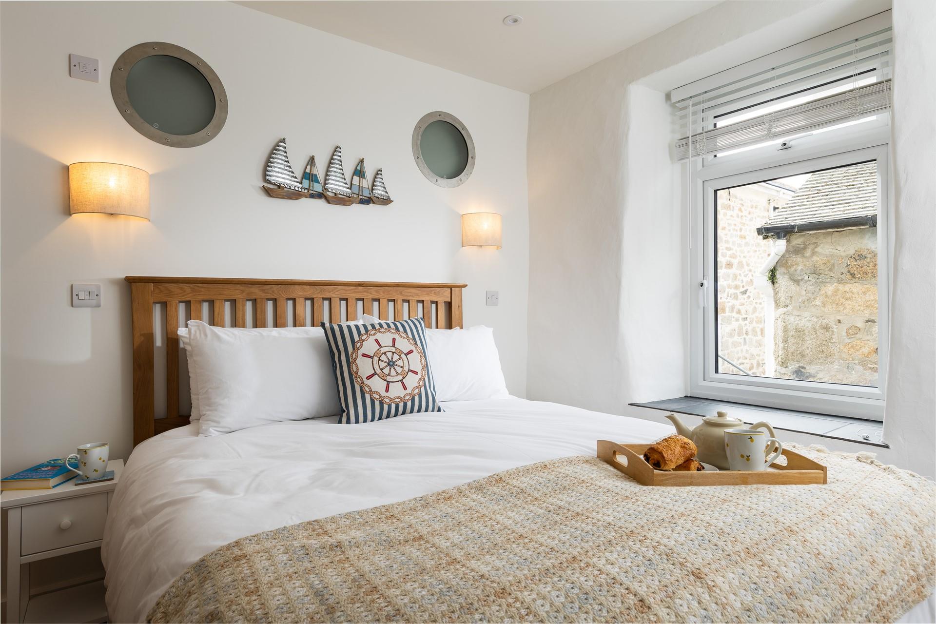 Nautical decor gives a nod to the coastal location.