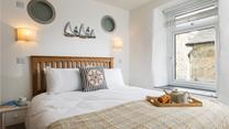 Nautical decor gives a nod to the coastal location.