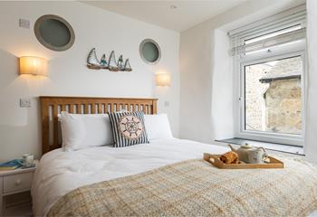 Nautical decor gives a nod to the coastal location.
