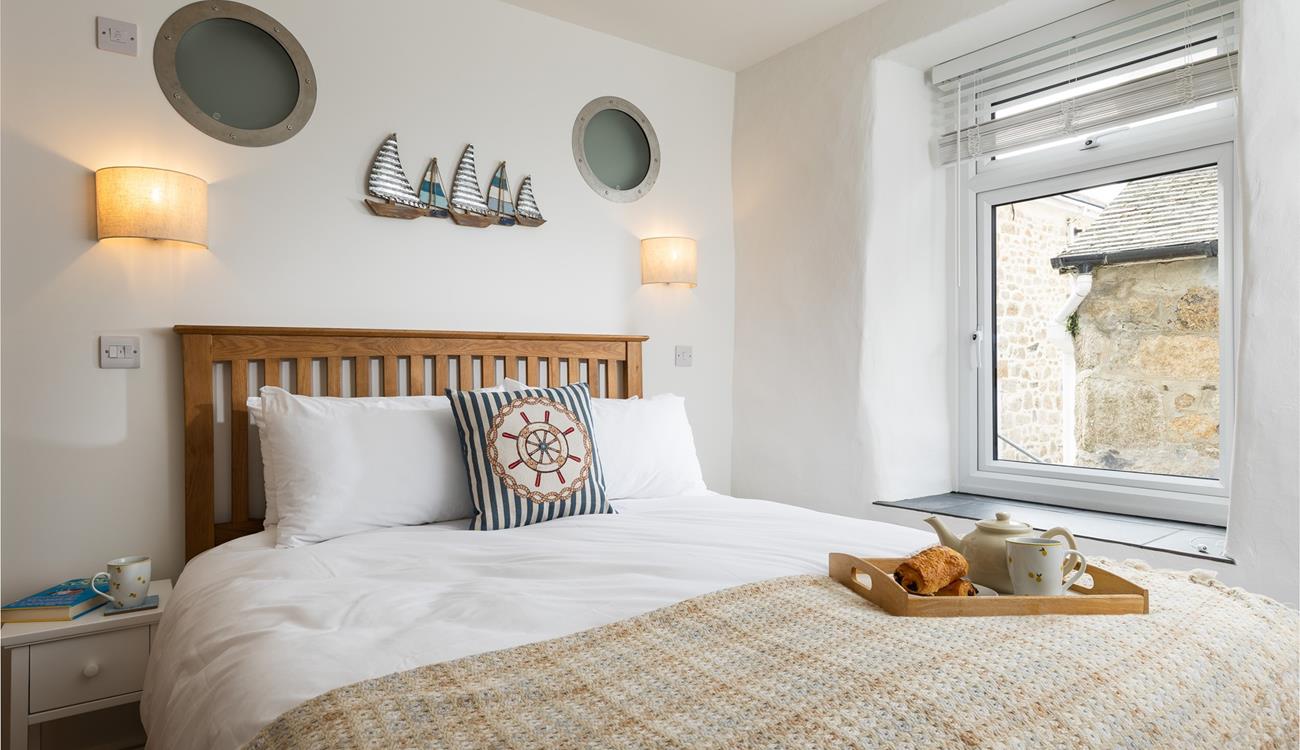 Nautical decor gives a nod to the coastal location.