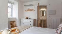 A stylish en suite and plenty of storage space in Bedroom 1.