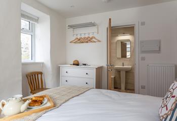 A stylish en suite and plenty of storage space in Bedroom 1.