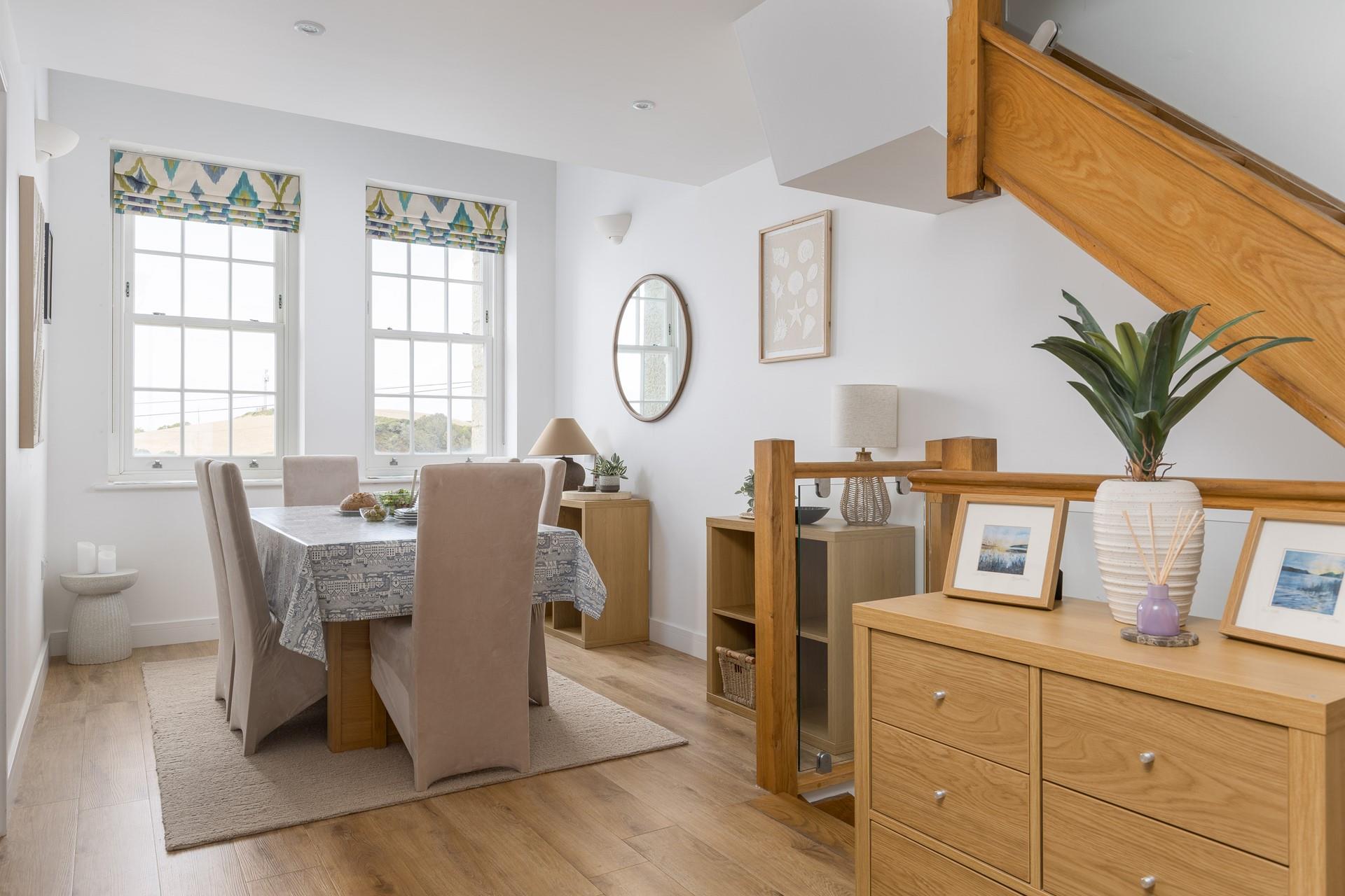 On the first floor, there's a light and airy kitchen and dining area.