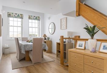 On the first floor, there's a light and airy kitchen and dining area.