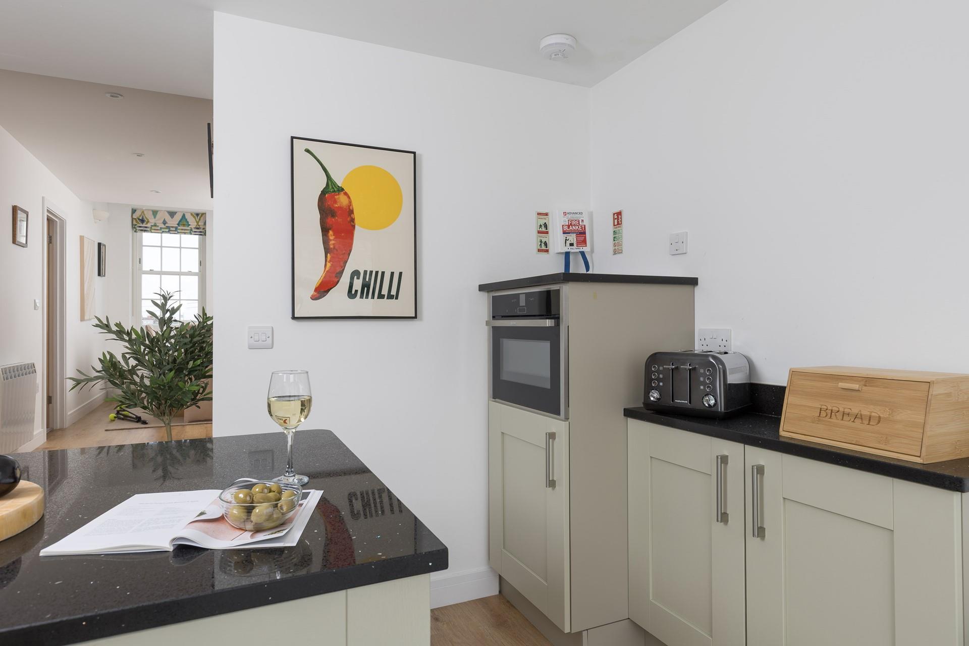 Pops of colourful artwork are dotted throughout The Tower House.