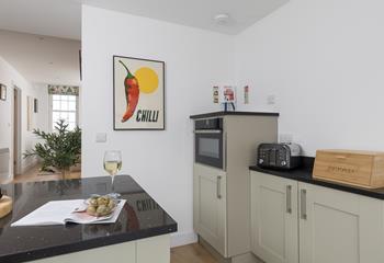 Pops of colourful artwork are dotted throughout The Tower House.