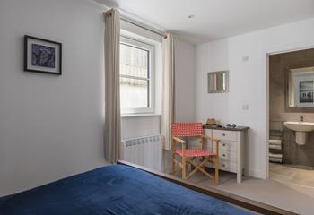 Relax in comfort with a king size bed and an en suite shower room.