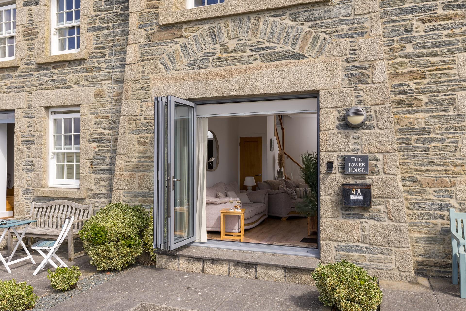 Bi-fold doors open out to make the most of the vista.