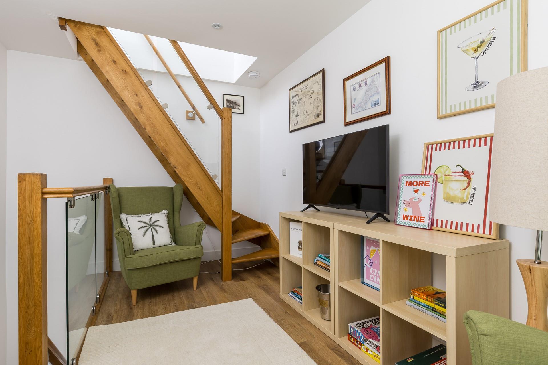 On the top floor, a cosy snug awaits!