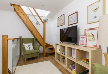 On the top floor, a cosy snug awaits!