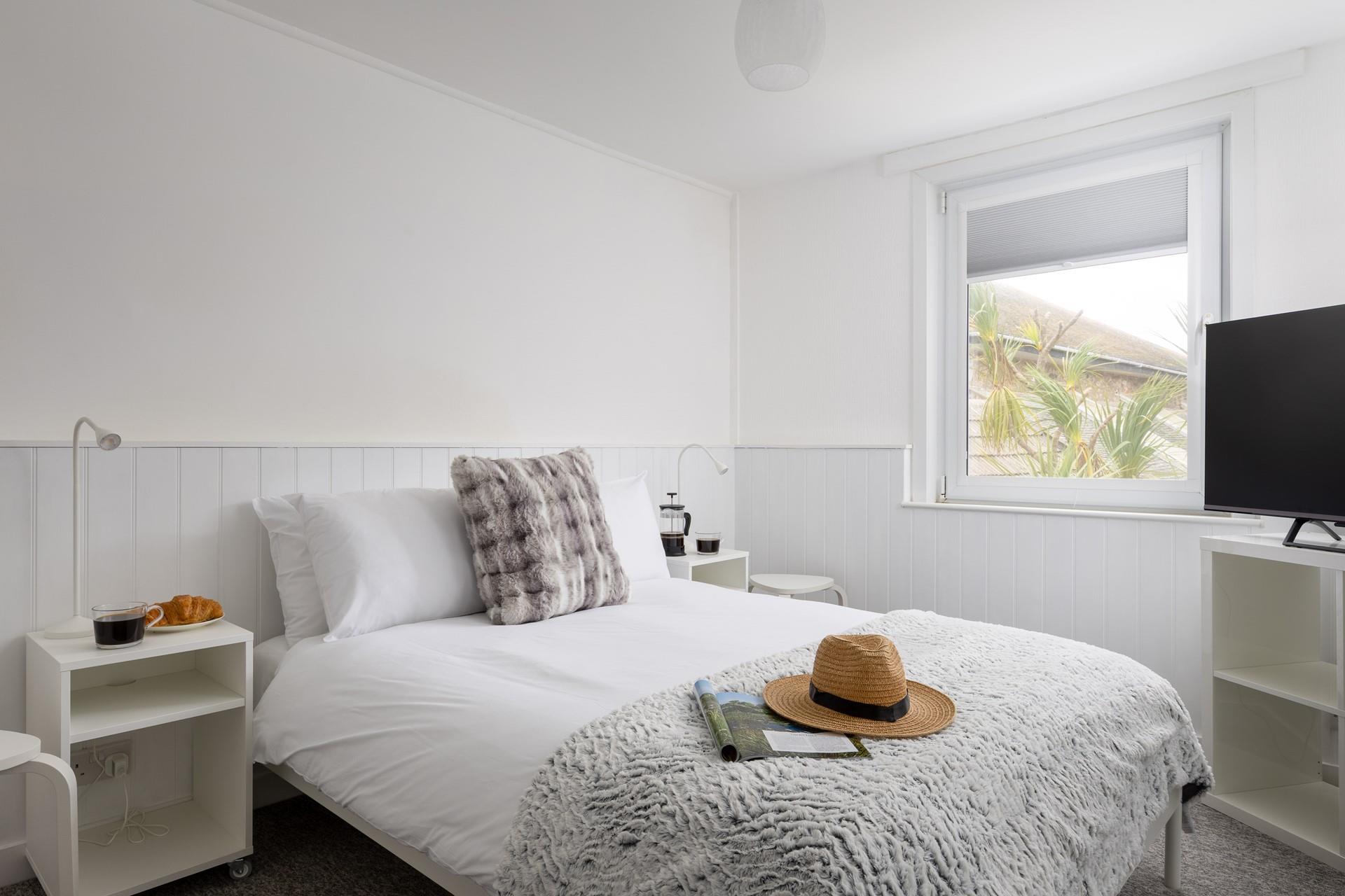 Bedroom 1 offers a comfortable double bed, where you'll sleep soundly after exploring the coast!