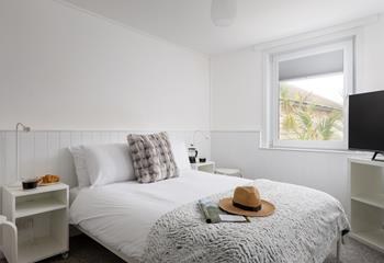 Bedroom 1 offers a comfortable double bed, where you'll sleep soundly after exploring the coast!