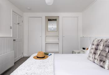 There's plenty of storage space in bedroom 1.