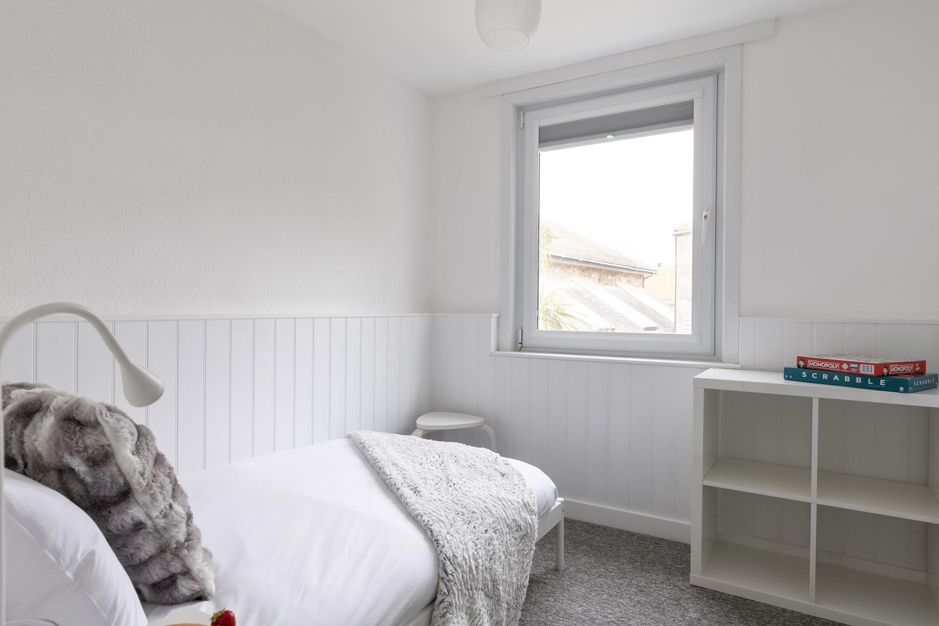 Bedroom 2 is suitable for an adult or child.
