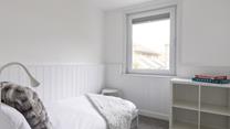 Bedroom 2 is suitable for an adult or child.