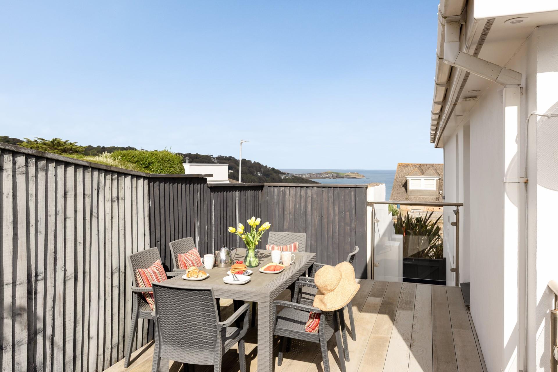 The raised decking is the perfect spot to enjoy some sunshine. 