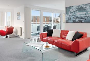Curl up on the sofa with your morning cuppa and watch as the sun rises over the ocean. 