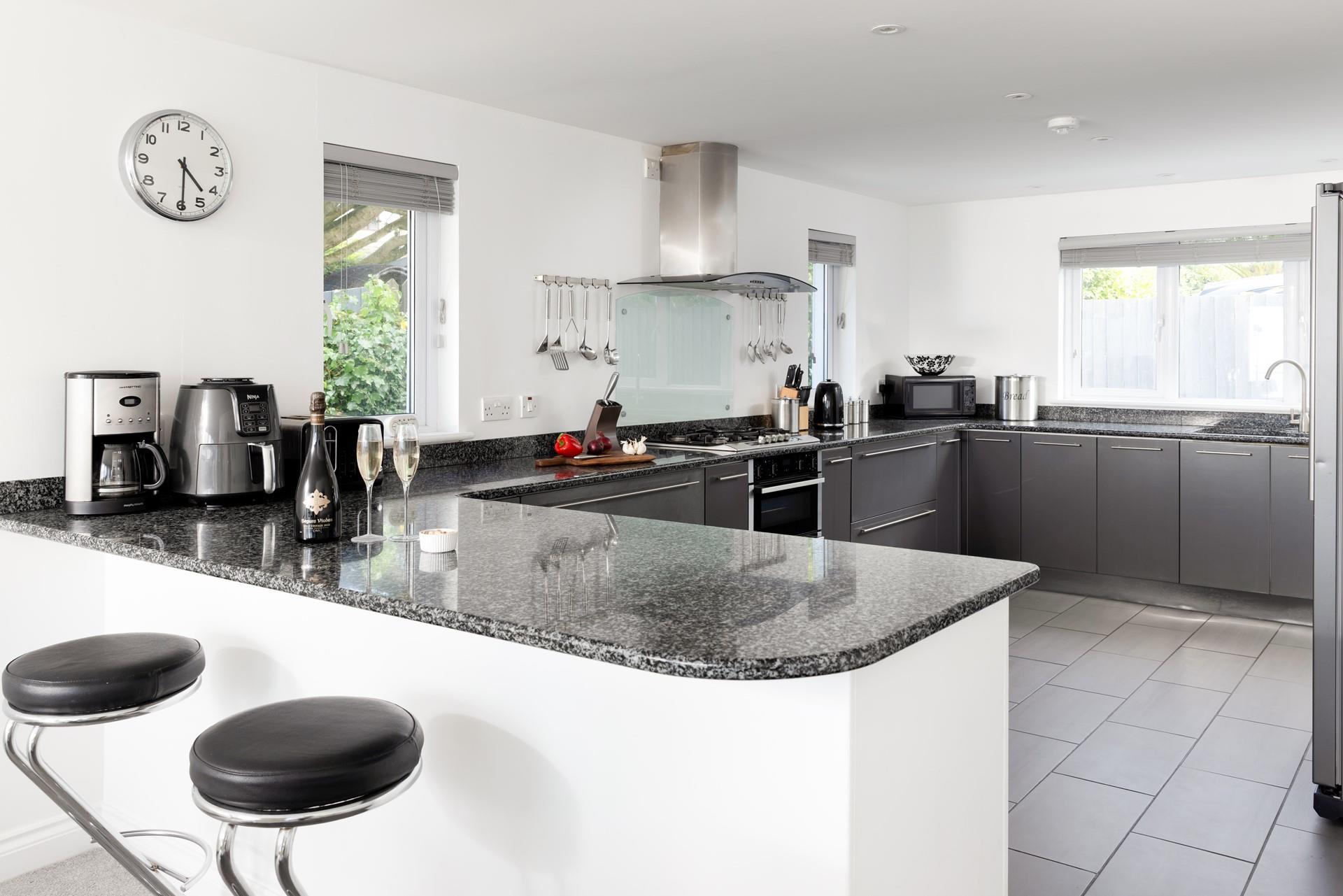 The modern kitchen has everything you need to make delicious meals. 