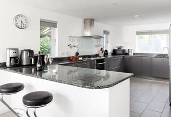 The modern kitchen has everything you need to make delicious meals. 