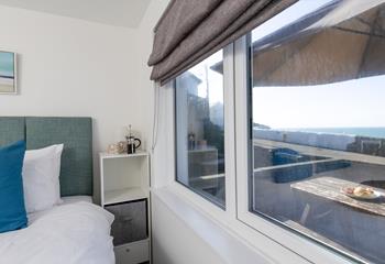 Retreat to bedroom 1 for a peaceful nights sleep by the coast. 