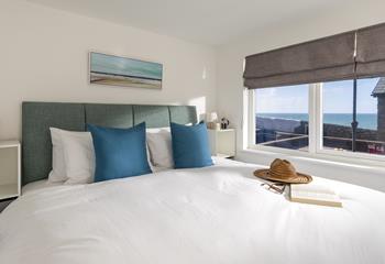 Wake slowly in the super king bed to the sound of the ocean. 