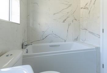 Sink into a hot bath after a windswept day on the Cornish coast. 